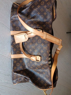 Travel bag used, brown, dimensions 30x60, zipper needs replacement