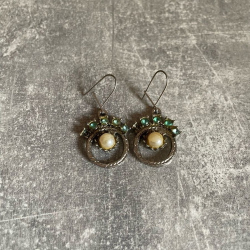 Dangling earrings used with turquoise and silver designs