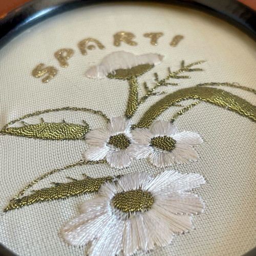 Wooden embroidered plaque used with Sparta theme