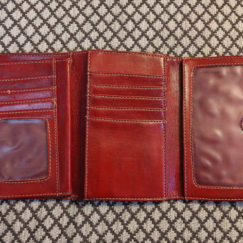 Red wallet used with multiple compartments