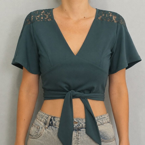 Green blouse with tie used, size M