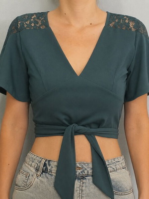 Green blouse with tie used, size M