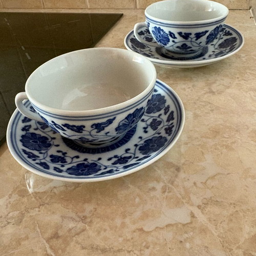 Chinese porcelain tea cups with saucers, white and blue decoration