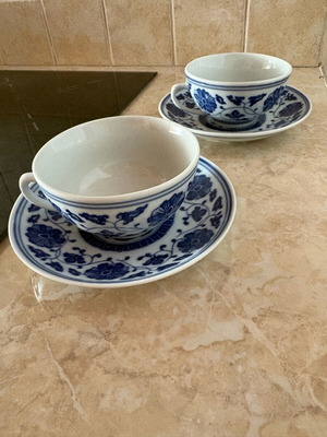 Chinese porcelain tea cups with saucers, white and blue decoration