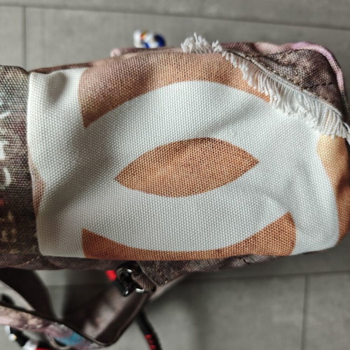 Chanel Graffiti backpack, size 40cm, beige canvas