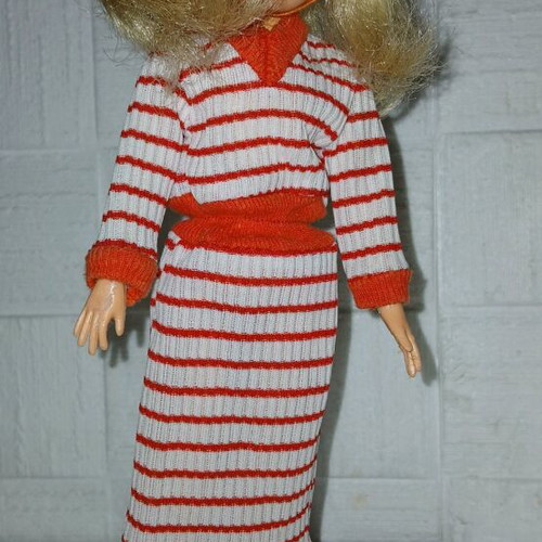 Sindy Pedigree doll used with dress, shoes, hat, and stand