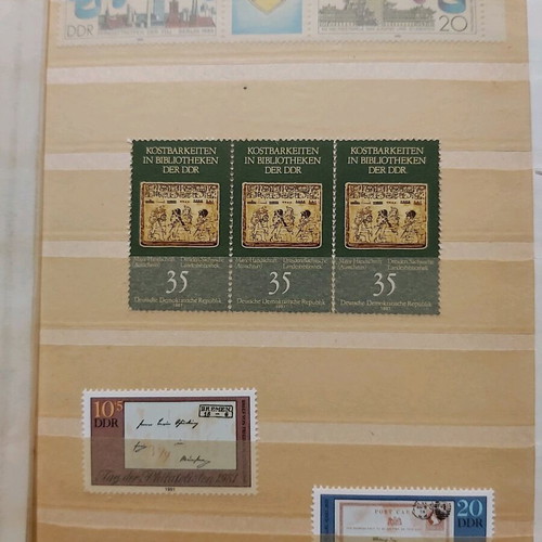 Mini album 16 pages like new with 36 unsealed series from East Germany