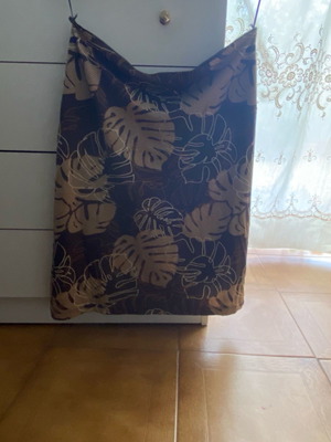Brown skirt with leaf patterns, size 42, knee-length