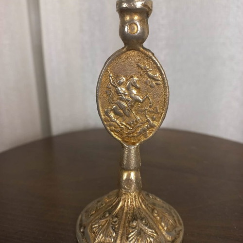 Christian brass candlestick used with Virgin Mary and Saint George