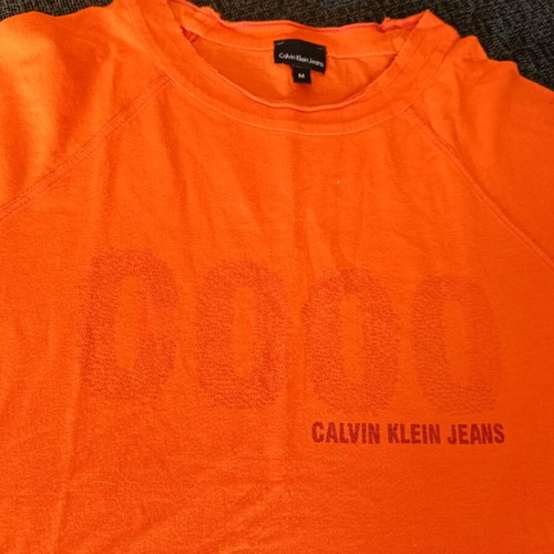 Calvin Klein tshirt orange like new, size M