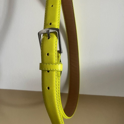 Women’s belt light green yellow with silver buckle like new, size S-M