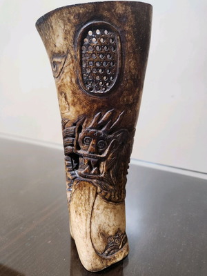 Handmade decorative item with traditional carved dragon design like new
