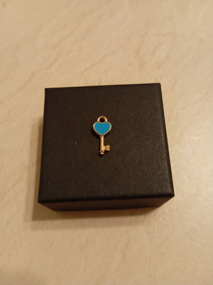 Pendant with key and heart design, blue and gold, like new