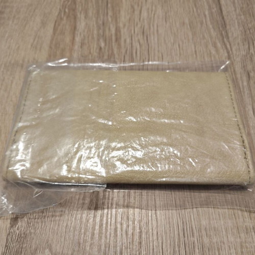 George Karelias and Sons collectible tobacco pouch beige new