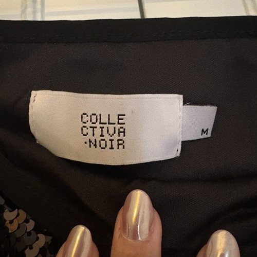 Mini skirt with sequins Collectiva Noir like new, black and silver, size M