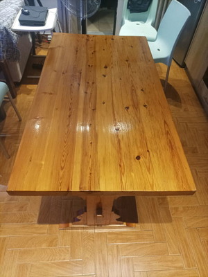 Wooden table like new with sturdy construction and natural finish