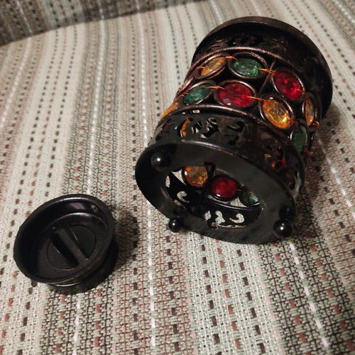 Metal lantern with colorful stones, ethnic style