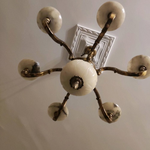 Vintage chandelier used, made of bronze and natural stone