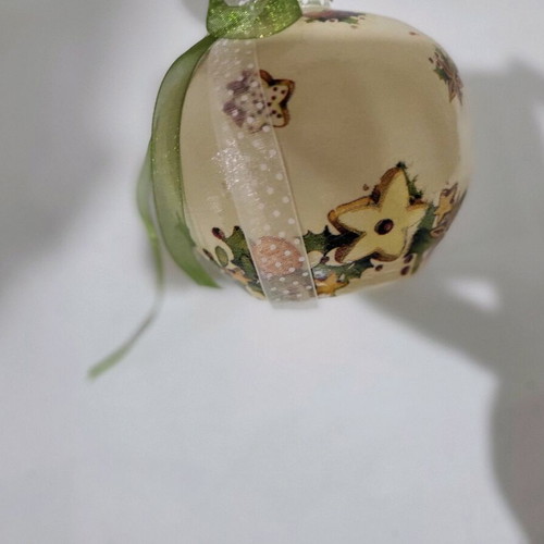 Christmas pomegranate new decorated with ribbons and decoupage