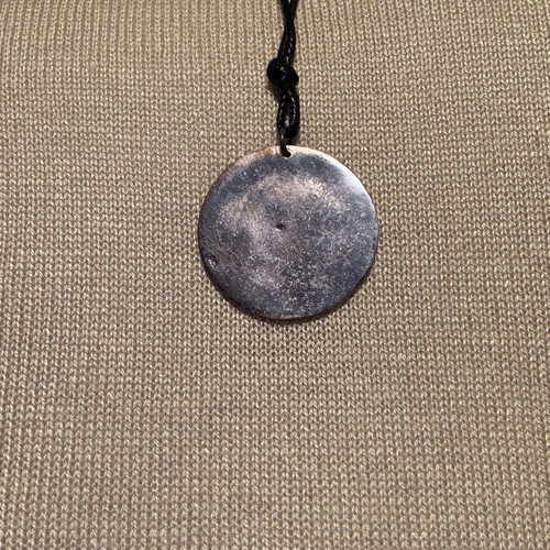 Handmade pendant like new with dark red stone and leather cord