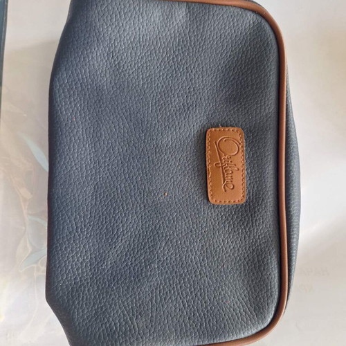 Oriflame cosmetic bag in dark blue eco leather