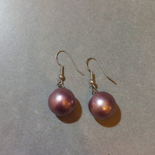 Dangling earrings used with purple and silver beads