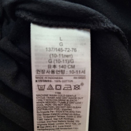 Gap Kids black long sleeve star top, size 140 cm