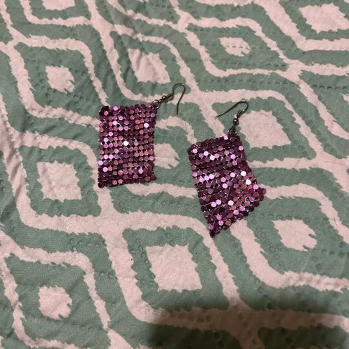 Purple earrings hanging like new