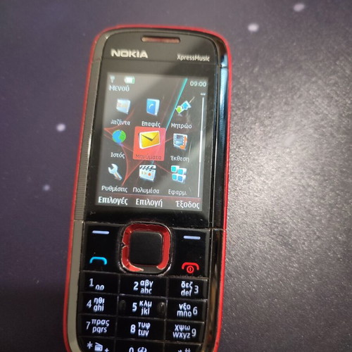 Nokia XpressMusic τηλέφωνο μεταχειρισμένο, σπασμένο τζαμάκι κάμερας, με φορτιστή
