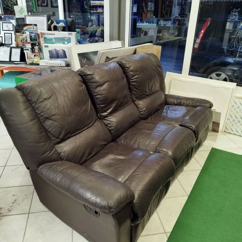 Three-seater black leather sofa with recline