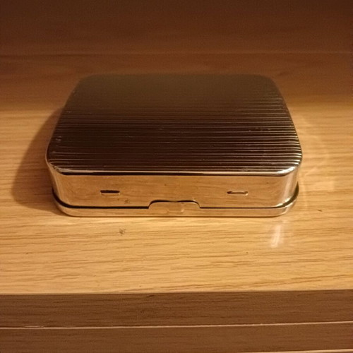 Rolling cigarette case used