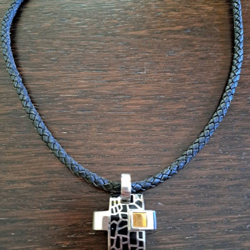 Impressive cross used with leather cord