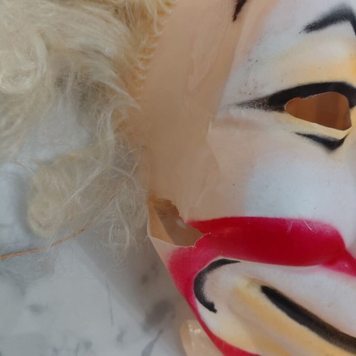 Vintage clown carnival mask from the 70s, used