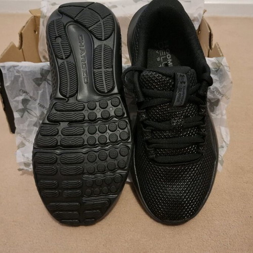 Under Armour UA W Charged Surge 4 running shoes new, black size 35.5