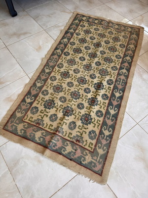 Handwoven rug used, 95 x 182 cm