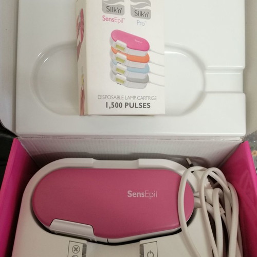 IPL Silk'n Sensepil hair removal device used with extra head