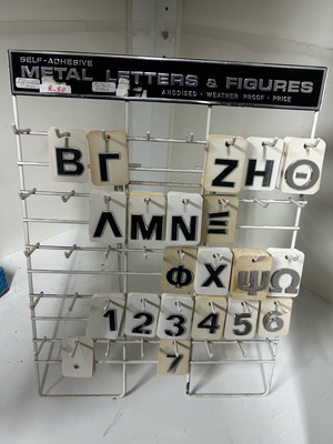 Sales stand used for self-adhesive metal letters and numbers