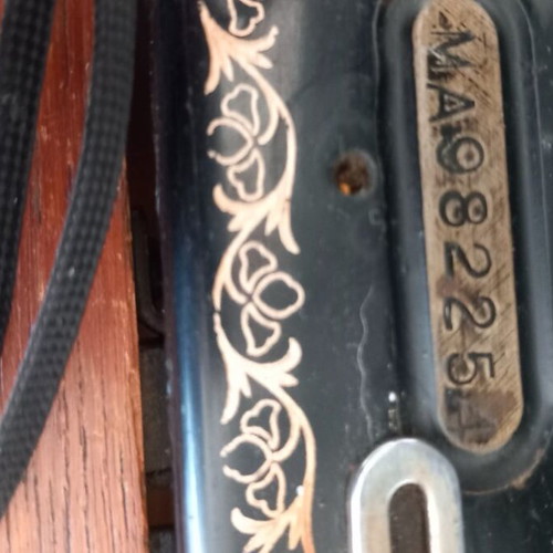 Singer sewing machine used with table