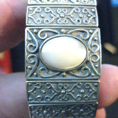 Silver bracelet like new with intricate design