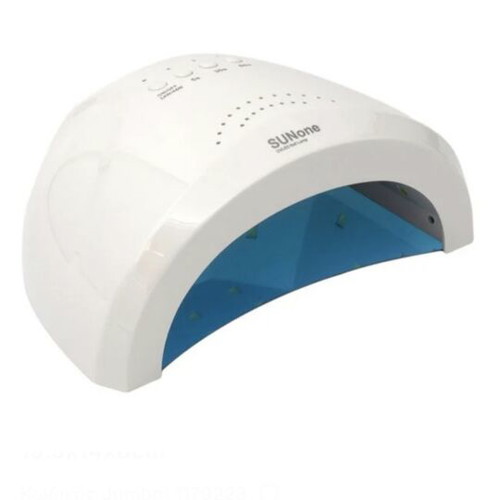 Nail dryer used with polymerization wheel, brush and 2 nail polishes
