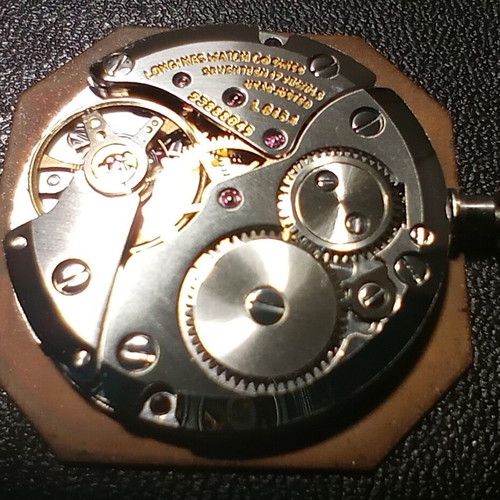 Vintage Longines Octagon watch from the 1970s like new, gold and black