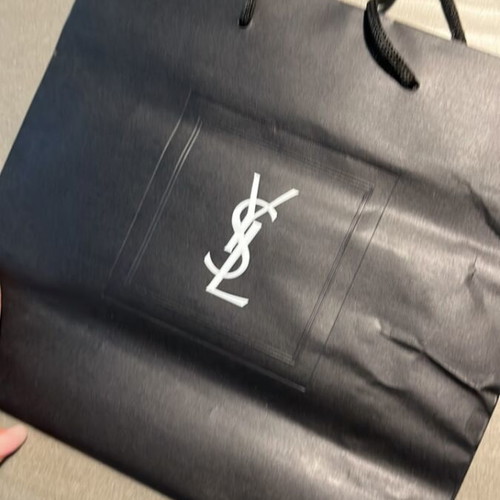 Yves Saint Laurent bag used with small tear