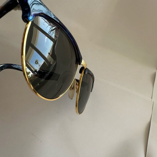 Vintage Kurzenberger sunglasses with blue marbled frame and golden details