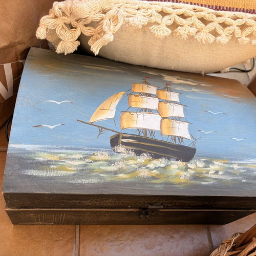 Handmade wooden decorative chest with painted sailboat used