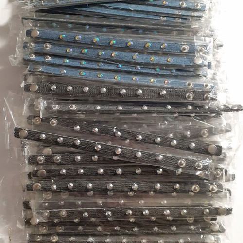 Pack of 235 denim and faux leather bracelets with rhinestones
