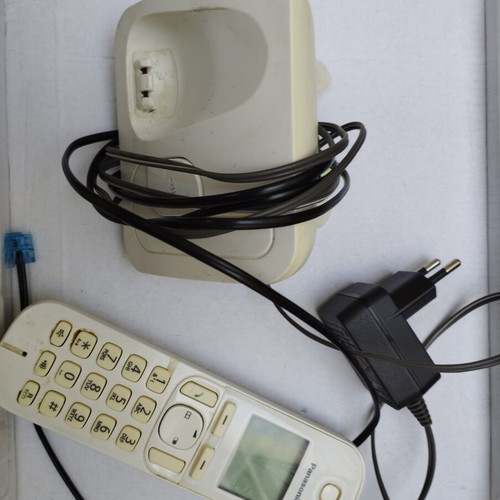 Two phones like new, one landline and one cordless, black and white