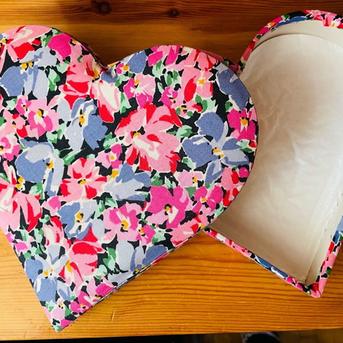 Heart-shaped gift box used with flowers, paper covered with fabric