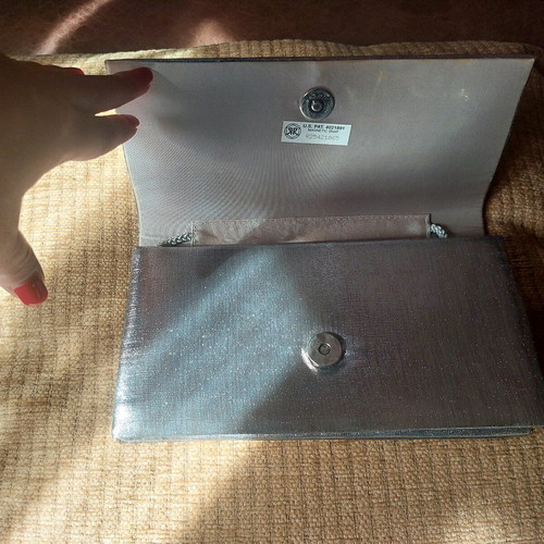 Vintage silver envelope hand bag like new with strap