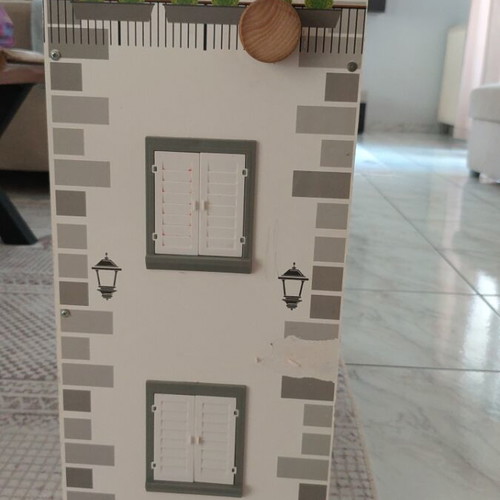 Wooden dollhouse used, 3 levels with stairs and decoration