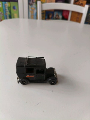 1933 Austin Taxi toy car used with Mars chocolate logo by Lledo